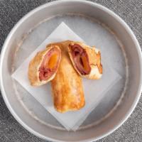 Ham Kolache · Ham and cheddar cheese in a home made bread pocket.