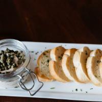 Smoked Salmon Dip · Made in-house and served with toasted crostini for dipping.