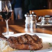 Johnny'S Bone-In Ribeye · Both Flavorful and tender with a perfect amount of marbling. 20 oz.