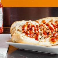 Buffalo Cheesesteak · Can be made hot or mild. Steak or chicken with buffalo, wing sauce, grilled onions, and melt...