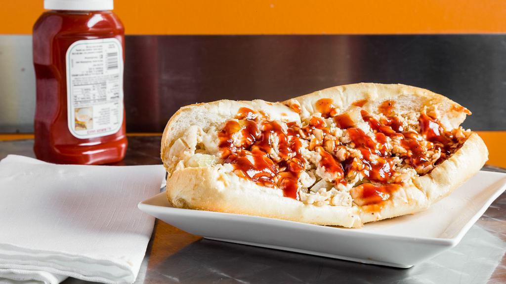 Buffalo Cheesesteak · Can be made hot or mild. Steak or chicken with buffalo, wing sauce, grilled onions, and melted cheese.