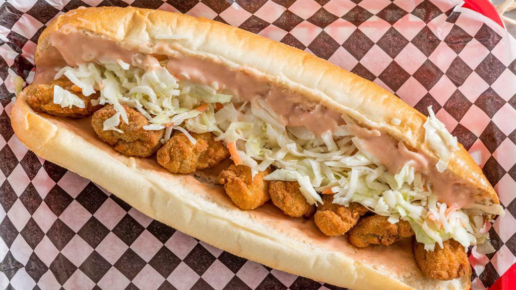 Po' Boy · Fried seafood on a hoagie roll . Served with russian dressing and coleslaw or lettuce and tomato.