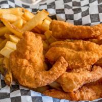 Shrimp Basket · Six pieces of shrimp with fries.