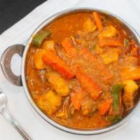 Vegetable Coconut Korma · Gluten free, vegetarian. Vegetable mix cooked with coconut milk and creamy sauce.