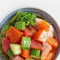 Poke · Tuna, salmon, crab salad, seaweed salad, cucumber, and masago.