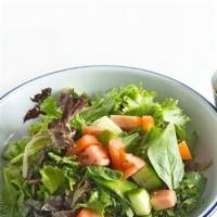 Green Salad (V) · Vegan. Mixed greens, tomato, cucumber, and ginger dressing.