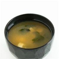 Miso Soup · Aka (red) and shiro (white) miso, tofu, seaweed, and scallions.