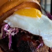 Brisket Sandwich · Traeger smoked, coleslaw, southern bbq sauce, sunny egg.
