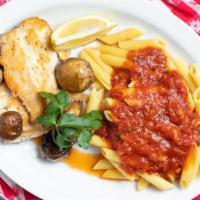 Al Limone · Chicken breasts pan fried in butter and lemon, with mushrooms. Served with penne pesto.