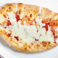 Calzone · Folded pizza filled with ricotta, mozzarella and ham then topped with tomato sauce and mozza...