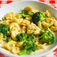 Tortellini Alla Panna · Meat filled pasta and sautéed broccoli in a rich cream sauce.