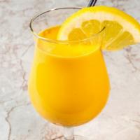 Mango Lassi · A refreshing fresh yogurt and mango drink.