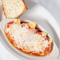 Baked Stuffed Shells Dinner · Jumbo shells of pasta filled with ricotta cheese, topped with plenty of marinara sauce, crow...