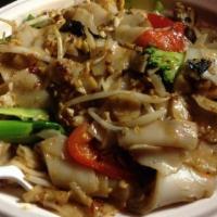 Pad Kee Mao / Drunken Noodles · Gluten free. Wide rice noodles, stir-fried with egg, fresh basil leaves, bell peppers, and b...