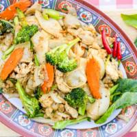 Pad See Ew · Gluten free, vegetarian. Wide rice noodles stir-fried with egg, broccoli and brown sauce. Ve...
