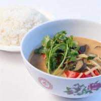 Gang Dang · Gluten free. Sweet red curry with coconut milk, Thai eggplants, purple eggplants, bamboo sho...