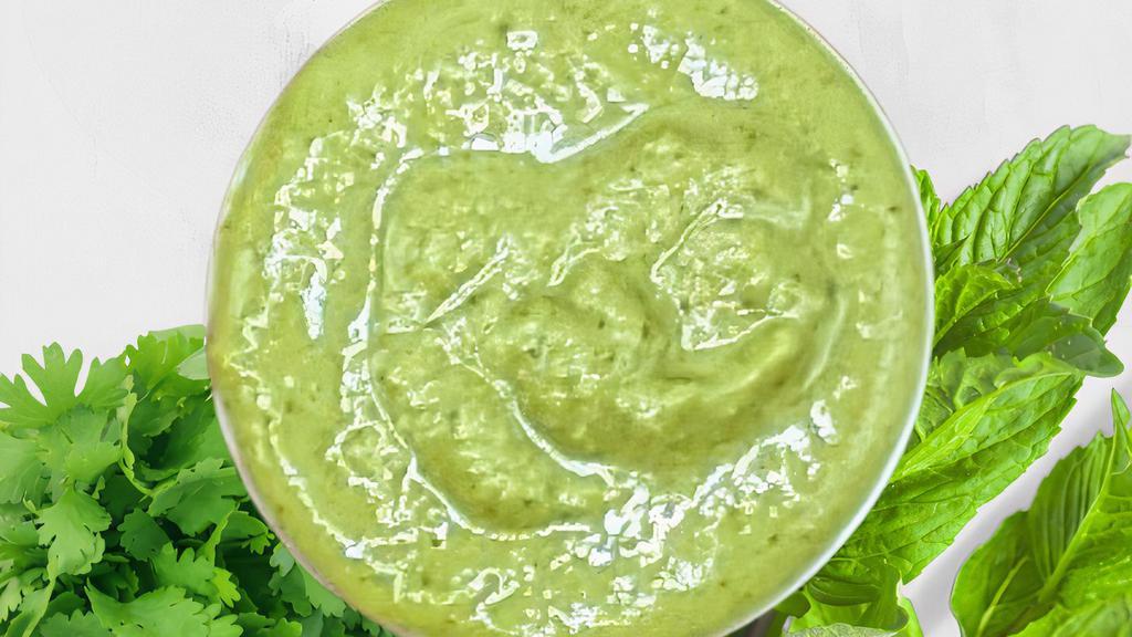 Green Chutney · A blend, made from cilantro, mint leaves, and cumin with a hint of lemon juice.
(Gluten Free,  Soy Free, Vegan, Vegetarian)