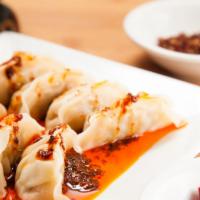 Dumplings In Red Chili Oil 红油饺子 · [spicy] Serving of 8
Served with red chili oil on top.