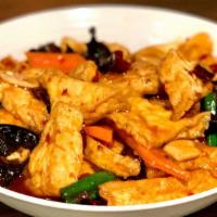 Home Style Stir Fried Tofu 家常豆腐 · Pan fried Tofu Stir fried with wood ear mushroom, carrot slices and green onion in spicy fer...