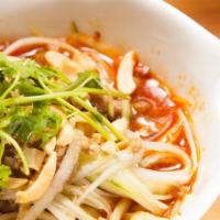 Dan Dan Noodles 担担面 · [spicy]
Pork and egg noodle served with cucumber and peanuts in a spicy sesame sauce.