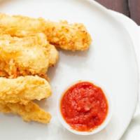 Breaded Mozzarella · Fresh cut mozzarella tossed in our homemade batter and fried to a golden brown. Served with ...