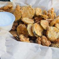 Fried Pickles · Golden brown southern favorite fried pickles chips. Served with our homemade ranch.