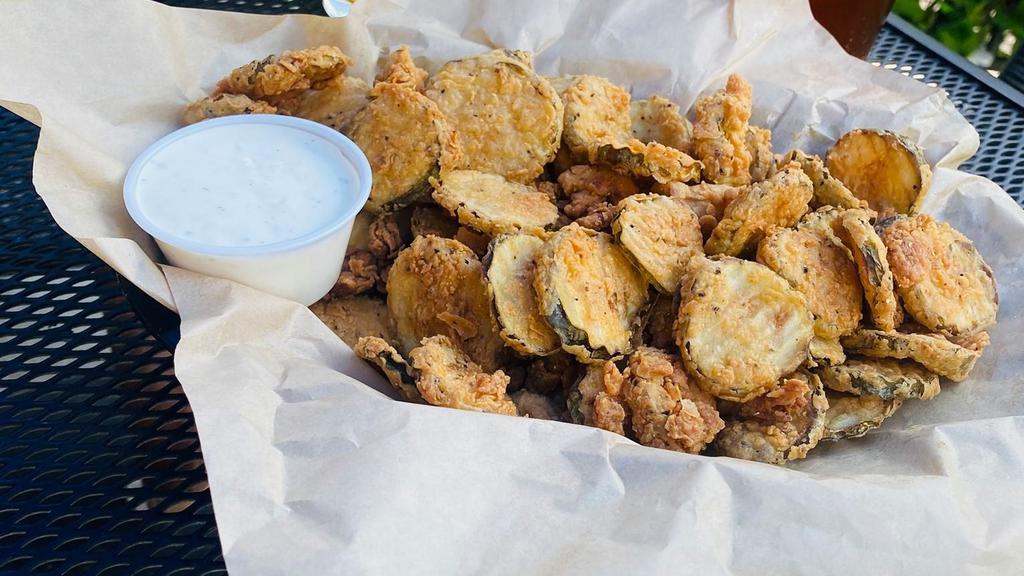 Fried Pickles · Golden brown southern favorite fried pickles chips. Served with our homemade ranch.
