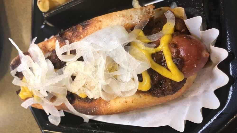 Coney Island Dog · Coney bun, all beef dog, meat chili, onions, yellow mustard