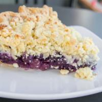 Blue Hawaiian Slice · Blueberries, crushed pineapple, and toasted coconut.