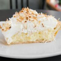 Toasted Coconut Cream Slice · Silky coconut filling, whipped cream, toasted coconut.