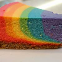 Rainbow Cheesecake Slice · Celebrate your PRIDE with our new seasonal rainbow cheesecake. An explosion of vibrant color...