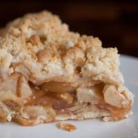 French Apple Petite · Locally grown granny smith apples, cinnamon, and a buttery crumb topping.