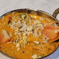 Vegetable Korma · Mixed Vegetables cooked with cream, coconut, Nuts and Raisins