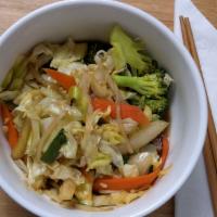 Stir Fried Vegetable · Cabbage, broccoli, carrot, zucchini, and mushroom with rice.