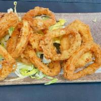 Crispy Calamari · Battered and flash fried served with lime wedge and sweet chili sauce