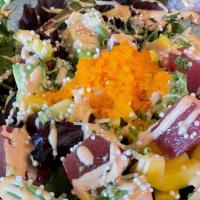 Tuna Avocado Salad · Spring mix, diced tuna, topped with rice caviar, tobiko, chives, spicy mayo, and yuzu dressi...