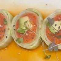 Spicy Tuna Naruto Style · Spicy Tuna and Avocado wrapped in English cucumber with ponzu based sauce.These items may be...
