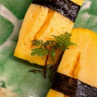Tamago (Egg Omelet) · These items may be served raw or undercooked or contain raw or undercooked ingredients.