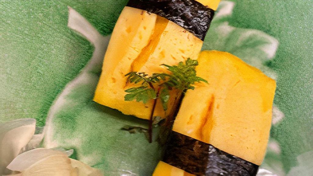 Tamago (Egg Omelet) · These items may be served raw or undercooked or contain raw or undercooked ingredients.