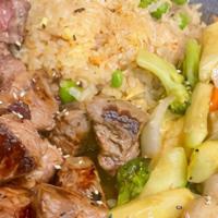 Hibachi Filet Mignon · Hibachi Style Filet Mignon with wok sauteed vegetables and fried rice.  Served with mushroom...