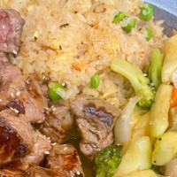 Hibachi Steak · Hibachi Style Steak with wok sauteed vegetables and fried rice.  Served with mushroom soup a...