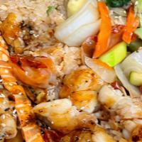 (Gf) Hibachi Twin Lobster Tails · Gluten Free hibachi style twin lobster tails and vegetables with fried rice.  Served with ho...