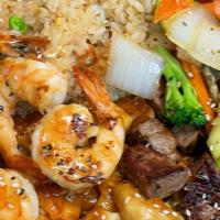 Hibachi Chicken, Shrimp, Steak · Hibachi Style Chicken, Shrimp and Steak with wok sauteed vegetables and fried rice.  Served ...