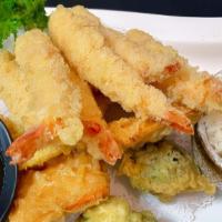 Shrimp Tempura Combo · Japanese style tempura fried shrimp and vegetables.  Served with ground ginger tempura sauce...