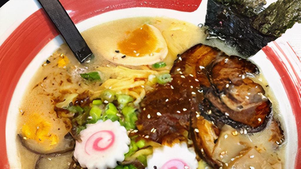 Sachi Spicy Ramen · Tonkotsu salt flavor with chashu, onions with pork, egg, fish cake, corn, scallion, bamboo shoot, wood ear, nori and black garlic oil, spiced with chef's special homemade spicy oil.