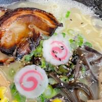 Tonkotsu Ramen · Tonkotsu salt flavor with chashu, onions with pork, egg. fish cake, corn, scallion. Bamboo s...