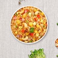 Pineapple Of Life Fried Rice · Your choice of protein. Fried rice with pineapple, raisins, onion, roasted cashews, and a to...