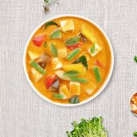 Yellow Mellow · Simmered in yellow curry spices with coconut milk, potato, onion, and carrot. Served with wh...