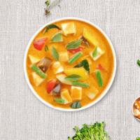 Super Massaman Curry · Your choice of protein. Simmered in yellow curry spices with coconut milk, potato, carrot, o...