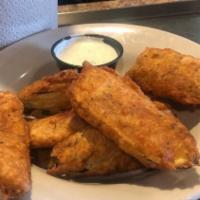 Fried Pickles · Cajun battered slices of dill pickles.
Served with house-made ranch dressing